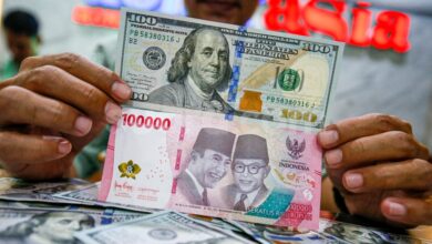 Rp14.000 per SGD Tersentuh Lagi, Rupiah Masih Tertekan Dolar AS dan Singapura